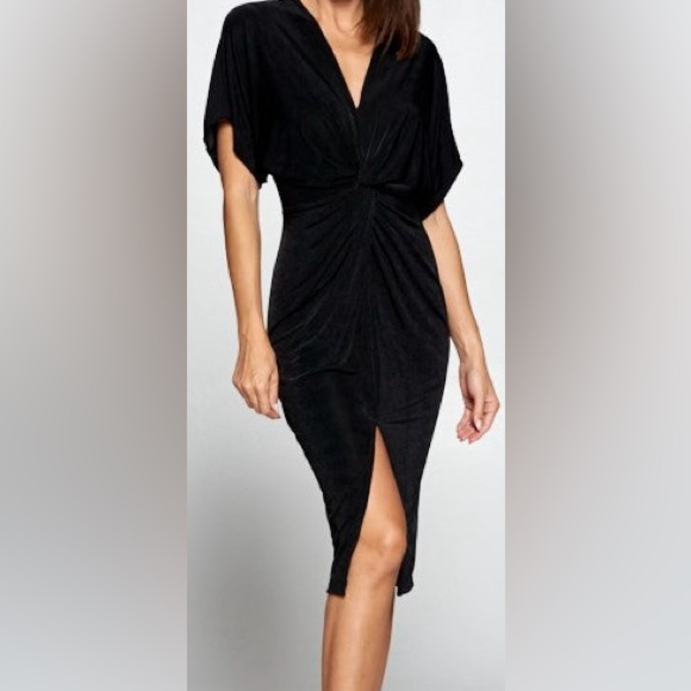 Black twist front Jordan dress. Brand Tag removed. Size medium